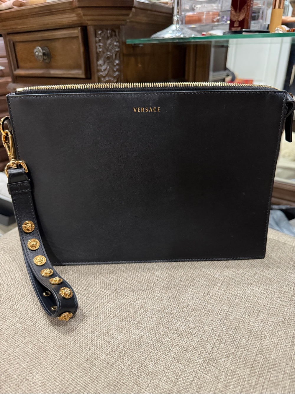 Versace Black Leather Zip Wristlet with Gold Medallion Strap